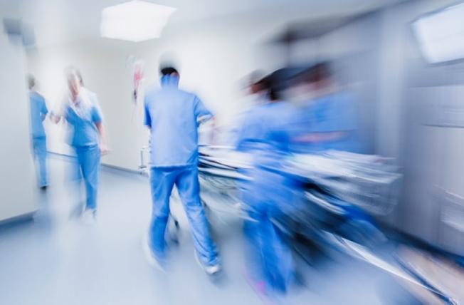 Rushing a patient to emergency surgery